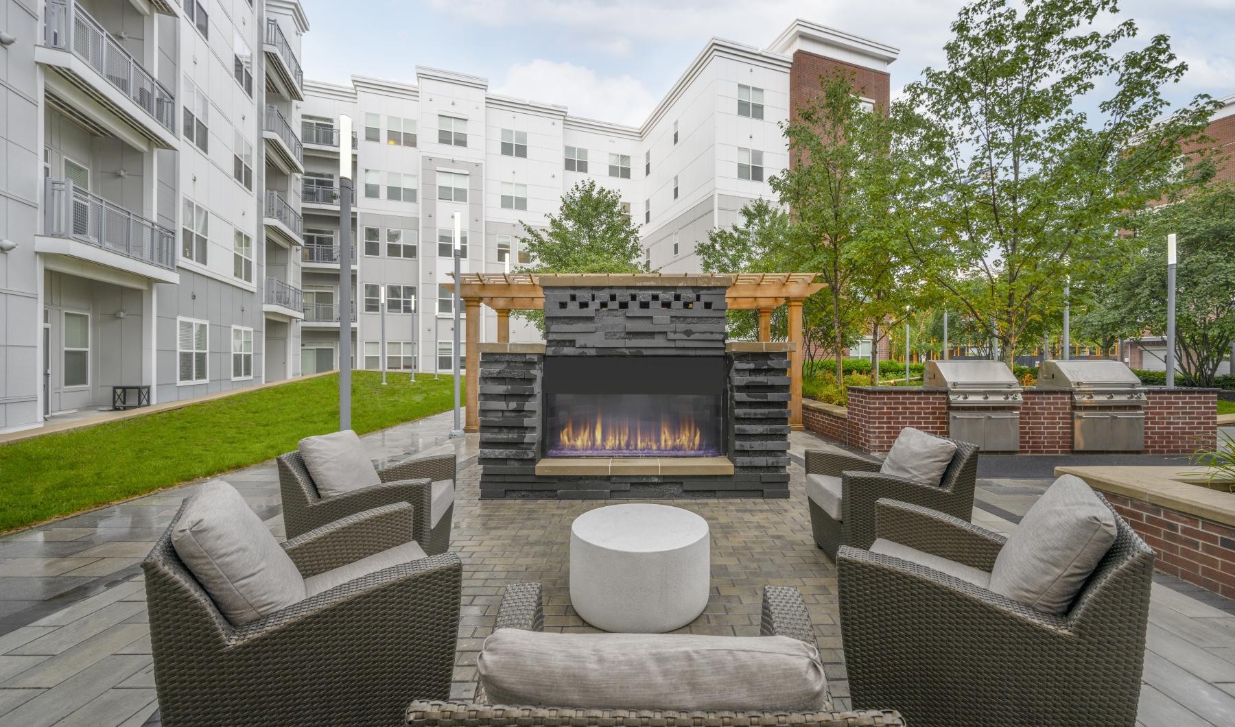 The essence of exceptional living a fireplace in a courtyard