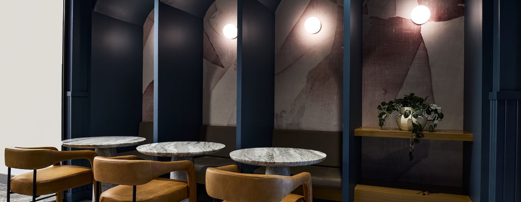 a room with small tables and chairs