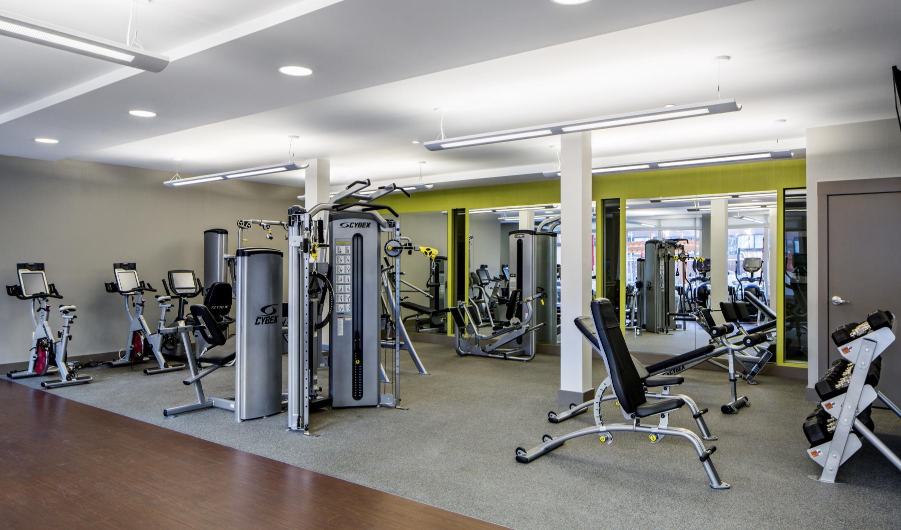 Quick access to state-of-the-art amenities a gym with exercise equipment